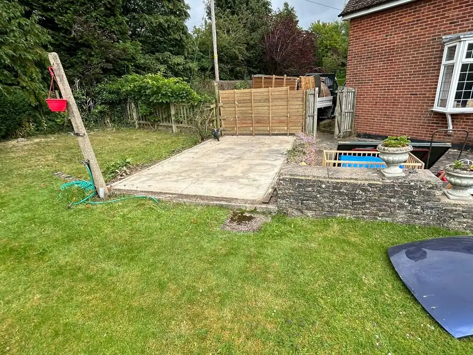 The same lawn after the garage was removed and the site left clear